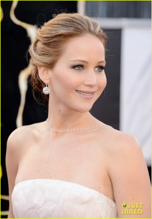 Jennifer Lawrence looking stunning at the Oscars with her beautiful brown hair.