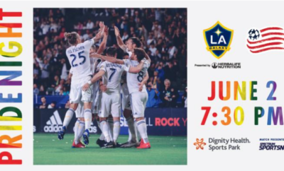 A poster for a soccer game with a group of soccer players.